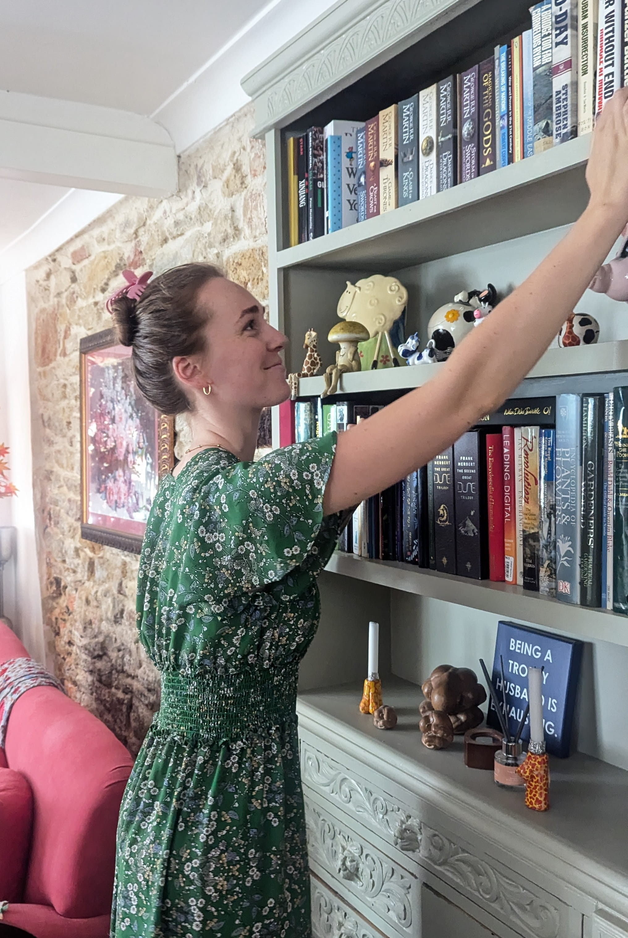 Lotty, founder of The Cleaning Coven, carefully cleaning a client's home